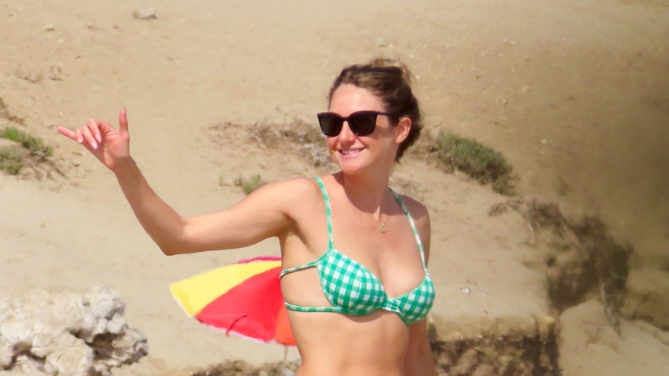 Shailene Woodley enjoys beach day in green-checkered bikini