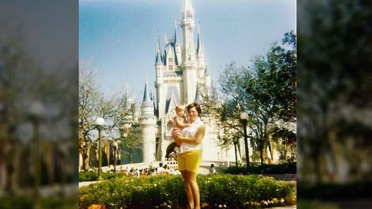 Mother and son take photo in same spot as they did in 1971 on Disney's opening day
