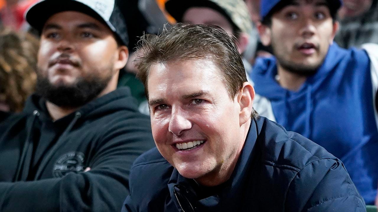 Tom Cruise surprises fans during outing with son Connor at Giants game