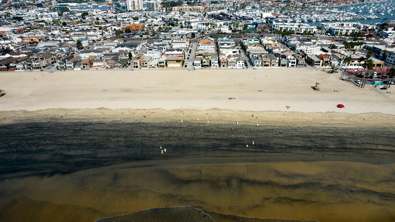 Southern California waters open for surfers, not fishermen, following oil spill