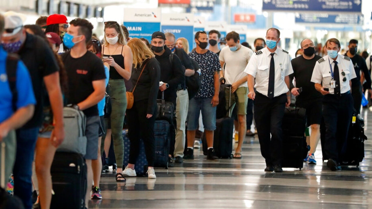 Time Magazine advises readers to keep wearing masks on planes even when