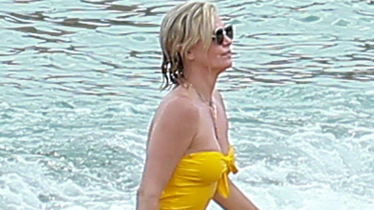 Charlize Theron stuns in yellow one particular-piece although getting a dependable mom on holiday vacation in Mexico