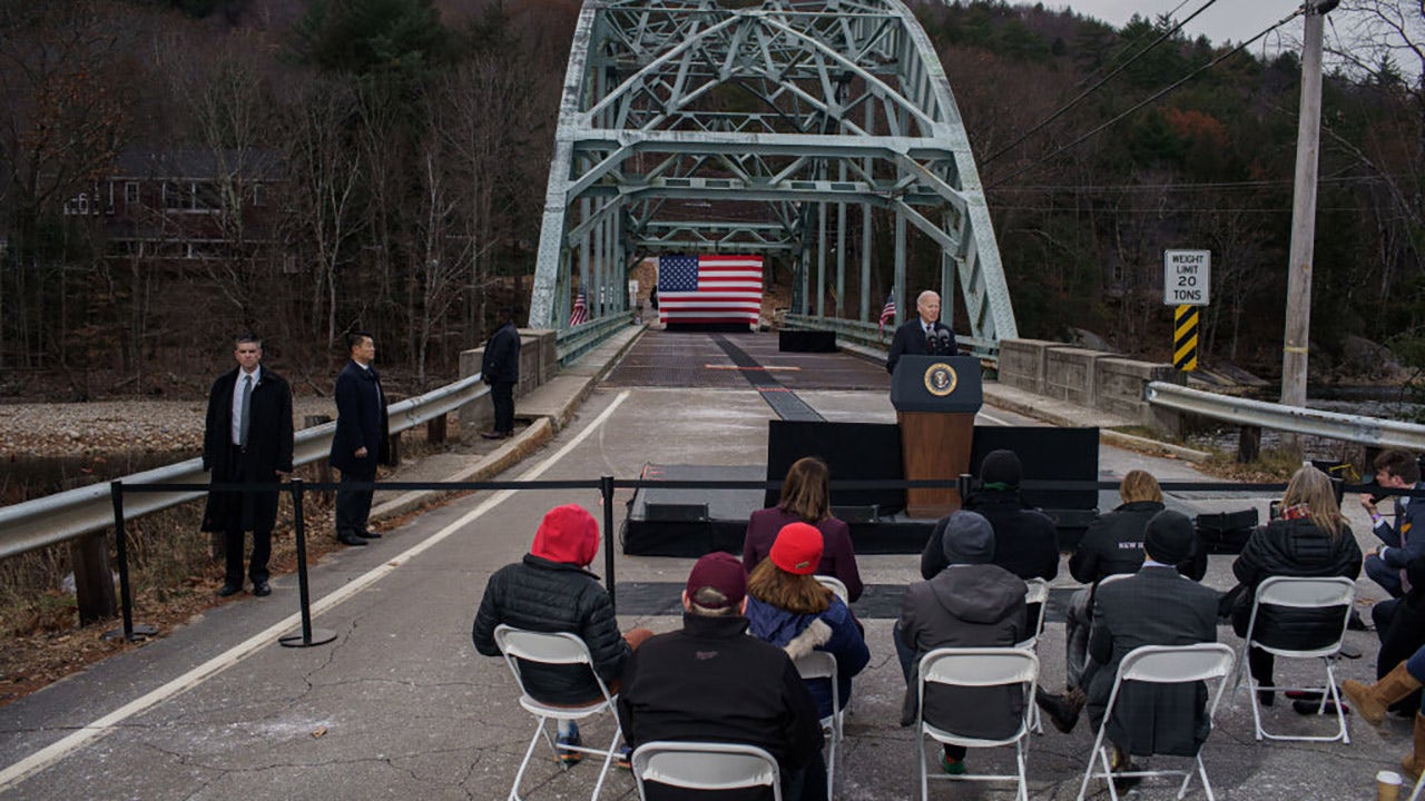 Biden visits old, rusty New Hampshire bridge to tout newly signed infrastructure bill