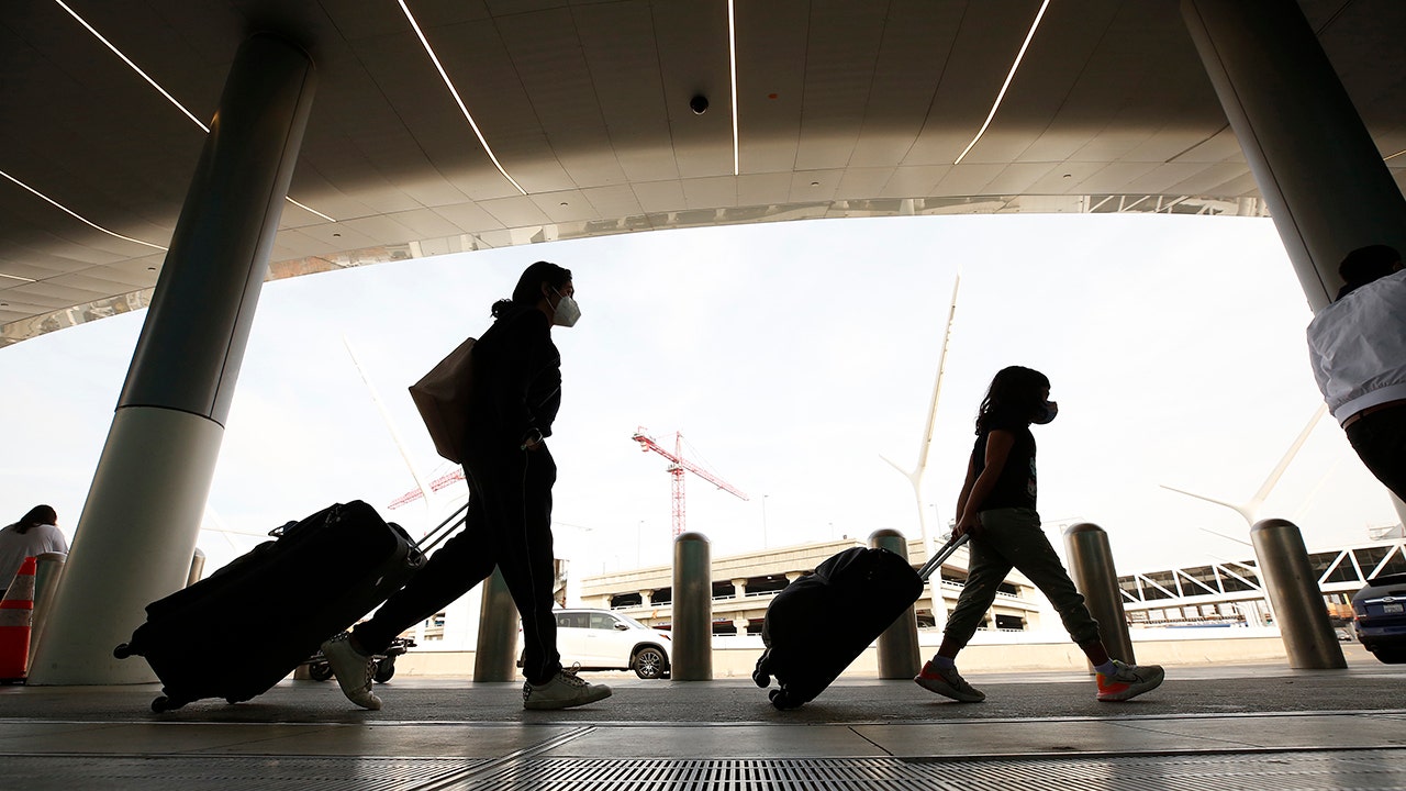 How an Airline Traveler Evades Baggage Fees with a Clever Fishing Vest