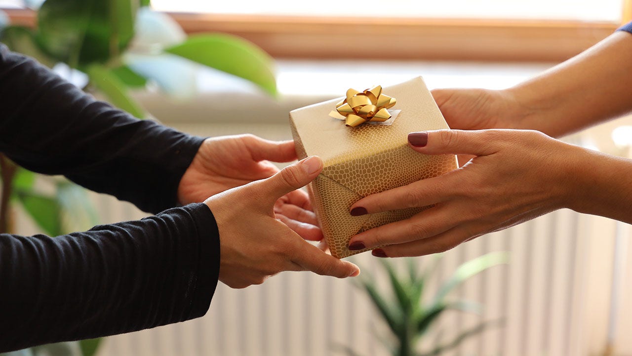 Woman's secret Christmas gift from husband finally exposed to family goes viral: 'Am I wrong?'
