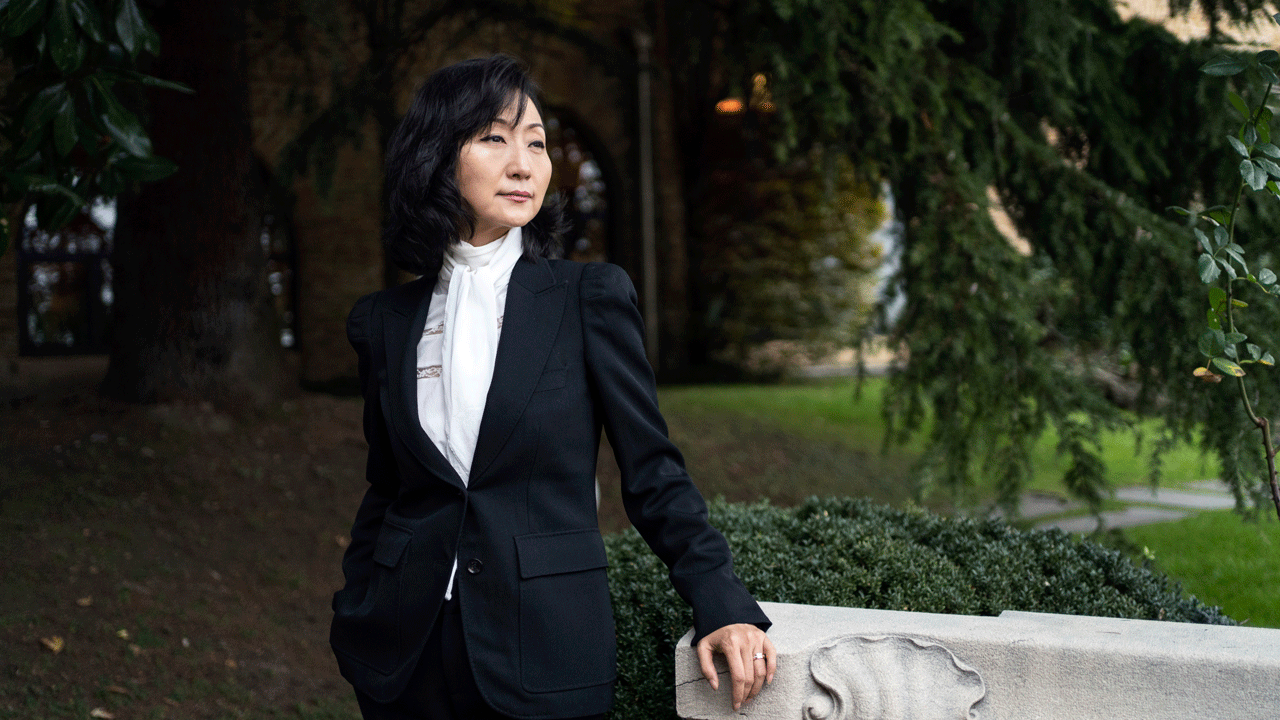 Grace Meng, the wife of former Interpol president Meng Hongwei, poses after an interview with The Associated Press in Lyon, central France, Tuesday, Nov. 16, 2021.?