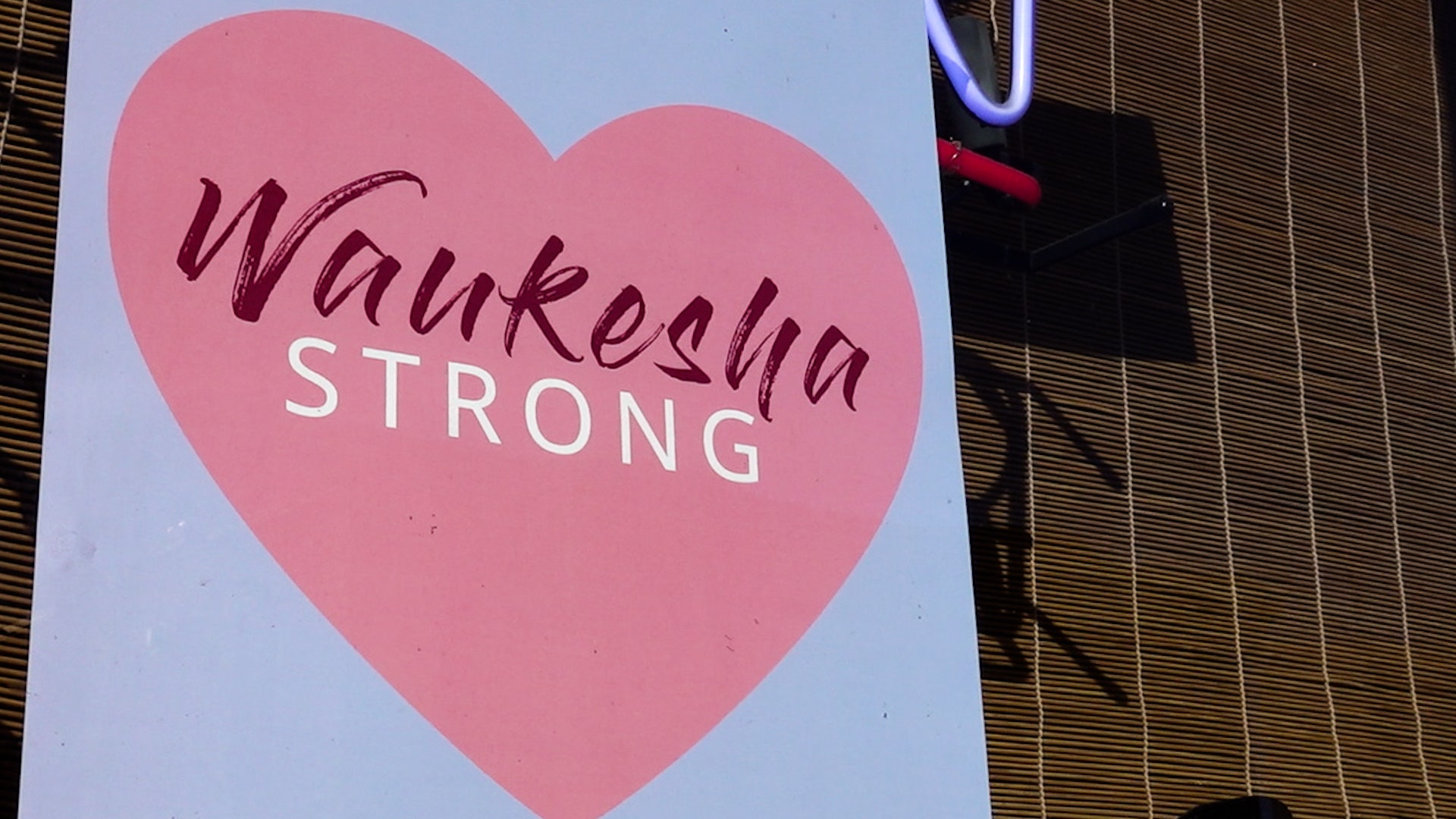 Waukesha parade aftermath: community comes together through fundraisers, signs and blue lights