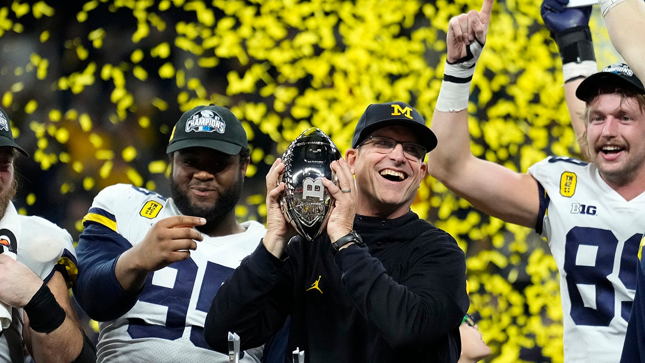 Michigan's Jim Harbaugh 'interested' in returning to NFL, report says 