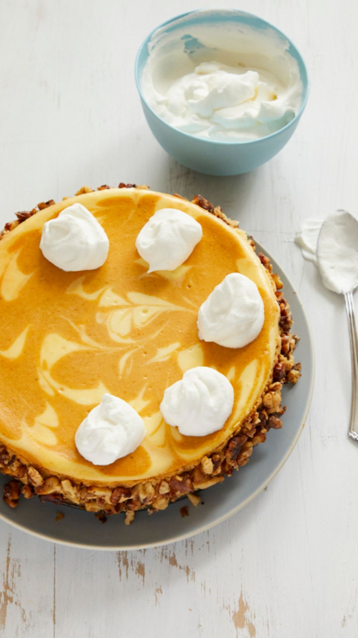 Pumpkin swirl cheesecake with candied walnuts for Christmas dessert