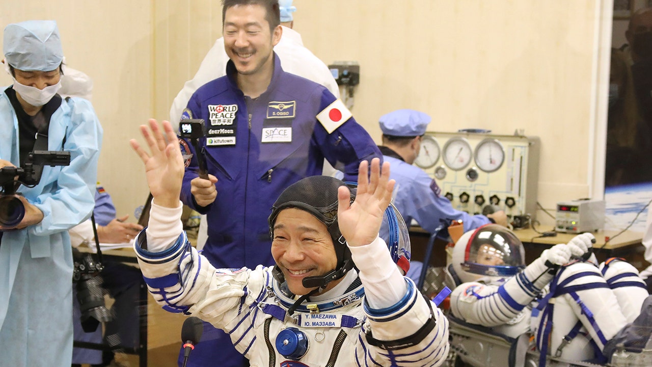 Japanese tourists visit International Space Station