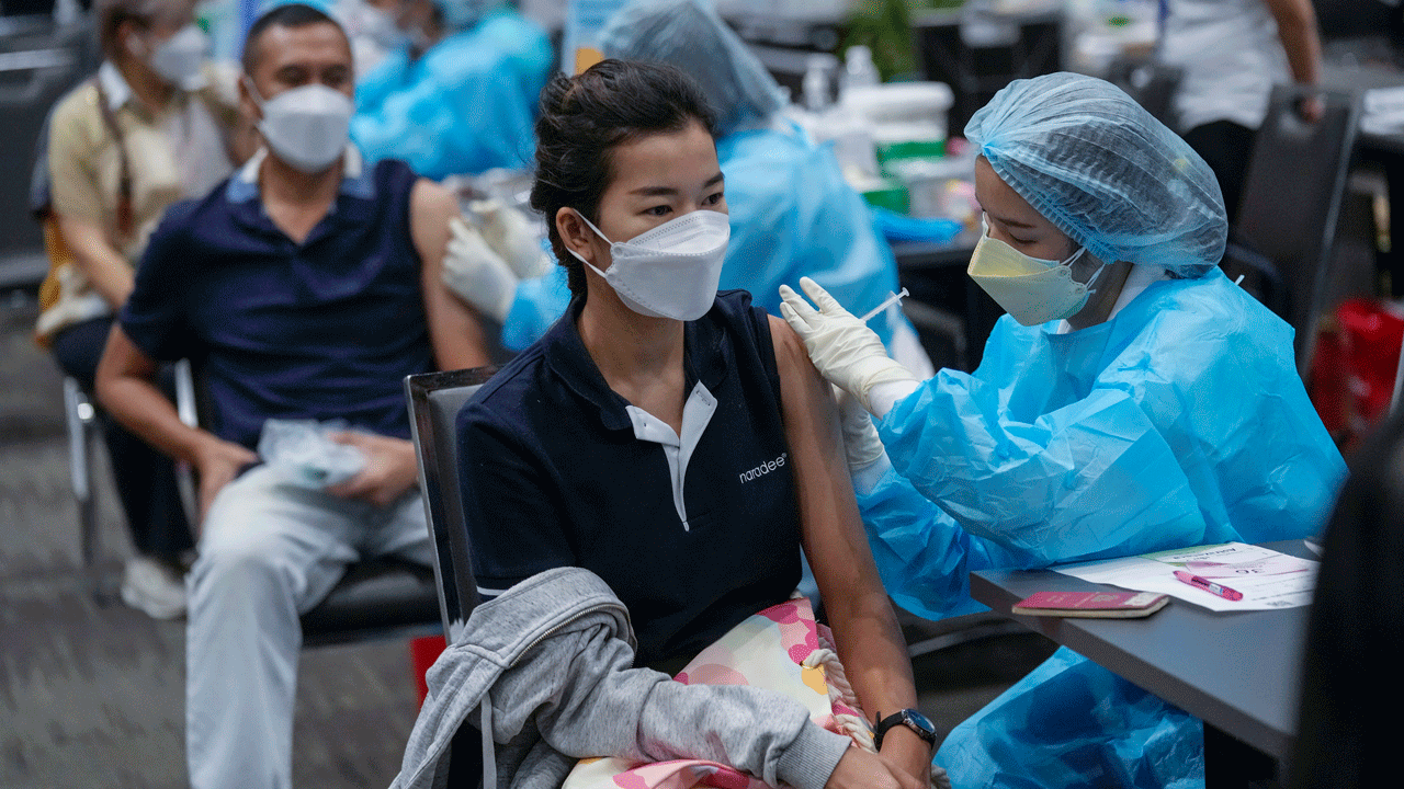 A health worker administers a dose of the AstraZeneca COVID-19 vaccine in Bangkok, Thailand on Nov. 17, 2021. 