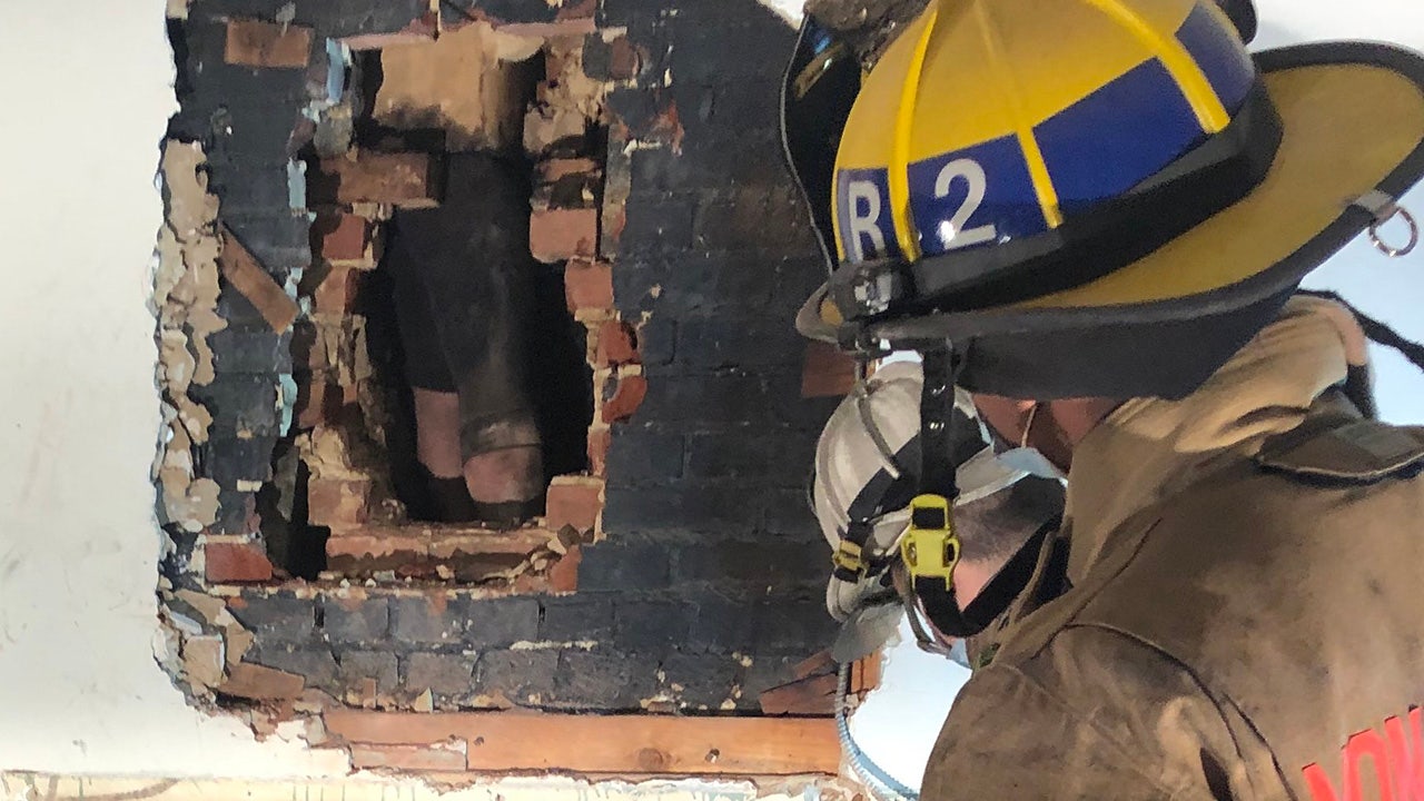 Maryland firefighters rescue suspected home intruder stuck in chimney