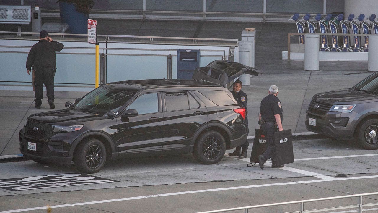 Suspect killed in shootout at SFO airport train station, DOJ now investigating