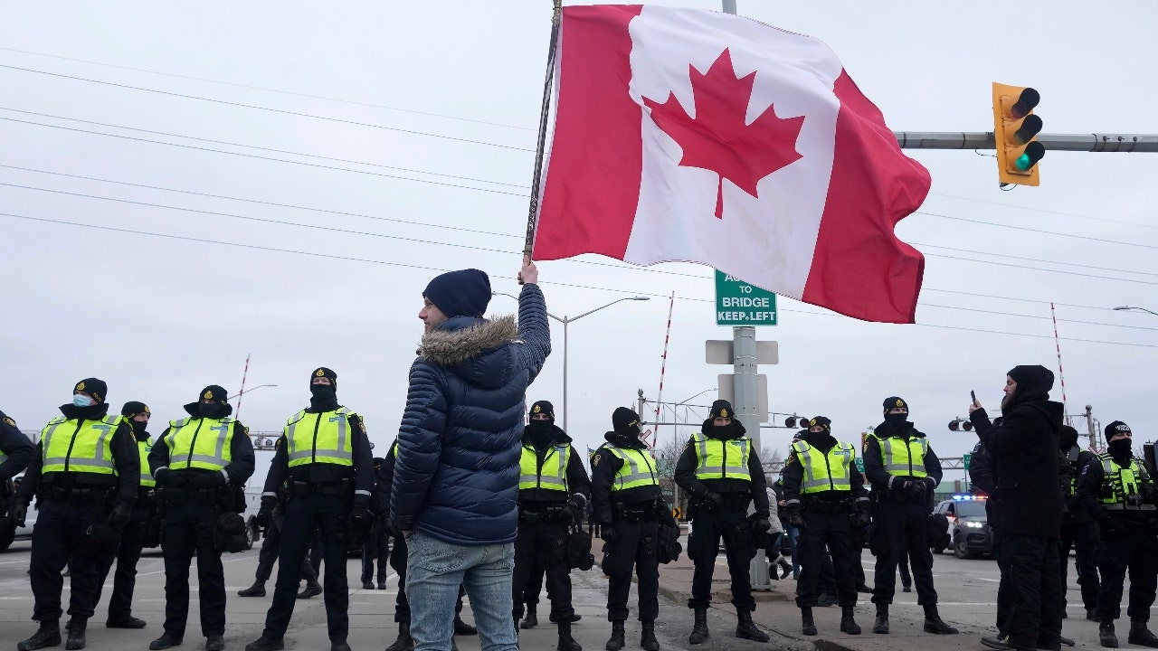 Canadian trucker protest on Ambassador Bridge ending as police follow through on emergency order