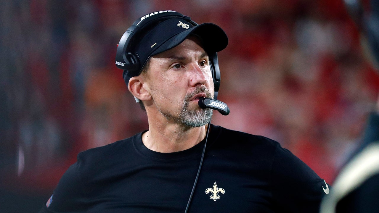 New Orleans, USA. August 13, 2023: New Orleans Saints Head Dennis Allen  encourages his players as they come off the field during NFL pre-season game  action between the New Orleans Saints and