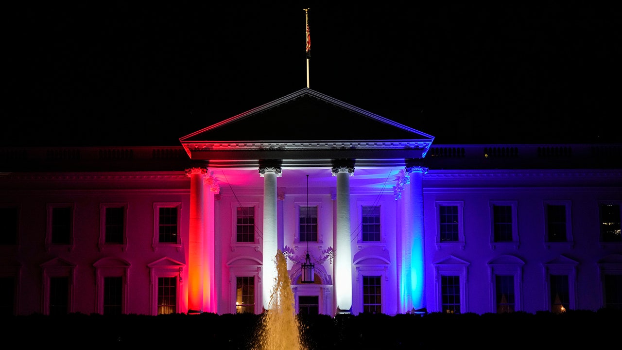 White House glows in red, white, and blue ahead of Beijing Olympics