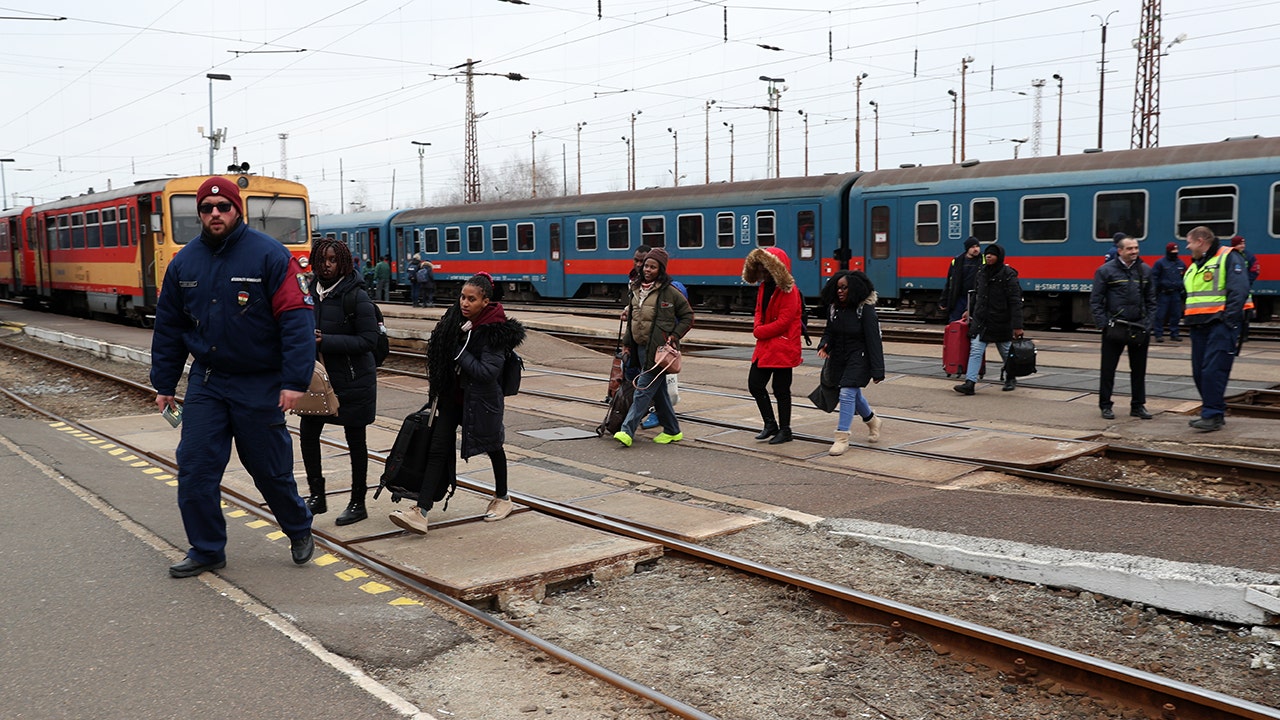 Ukraine's refugees flood across western border, fleeing for their lives: Photos show the reality