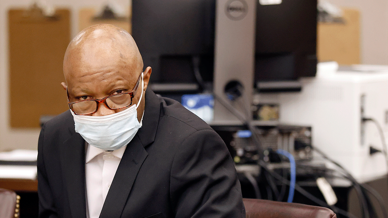 Defendant Billy Chemirmir listens to motions and language being discussed and sent to the jury in his capital murder trial at the Frank Crowley Courts Building in Dallas, Nov. 19, 2021. 