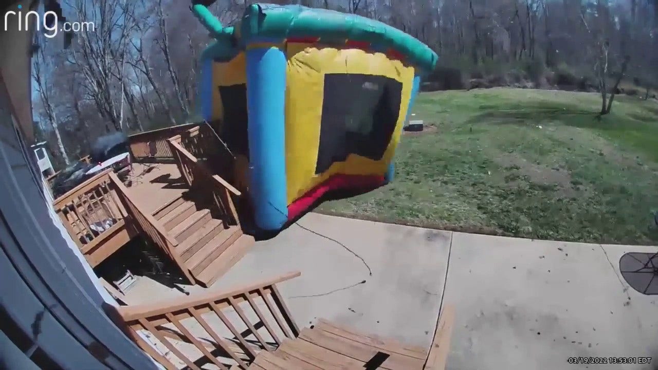 NC mom's terrifying video shows bounce house picked up by wind, nearly ...