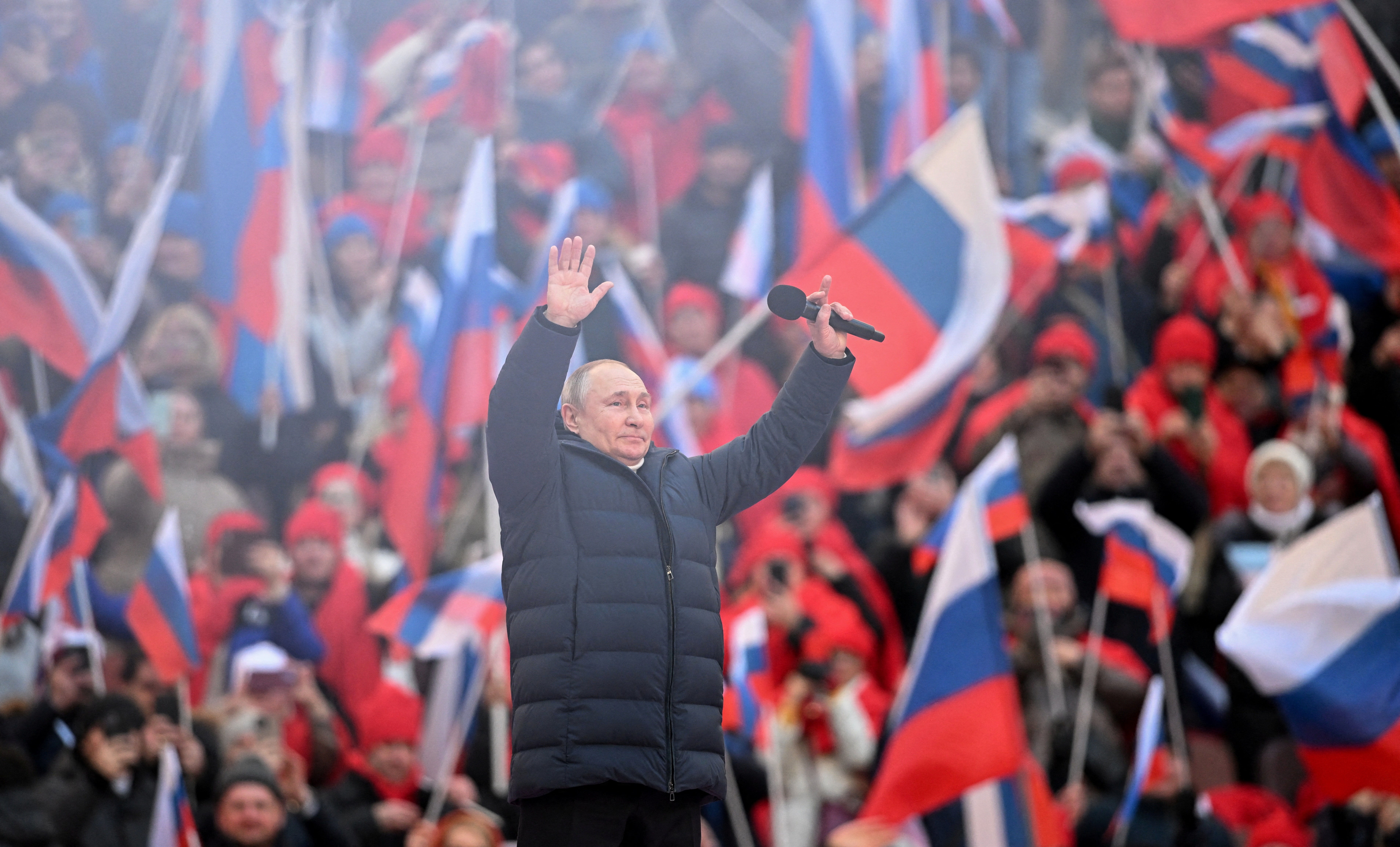 Putin appears at huge pro-war rally as Russian troops continue attack on Ukraine