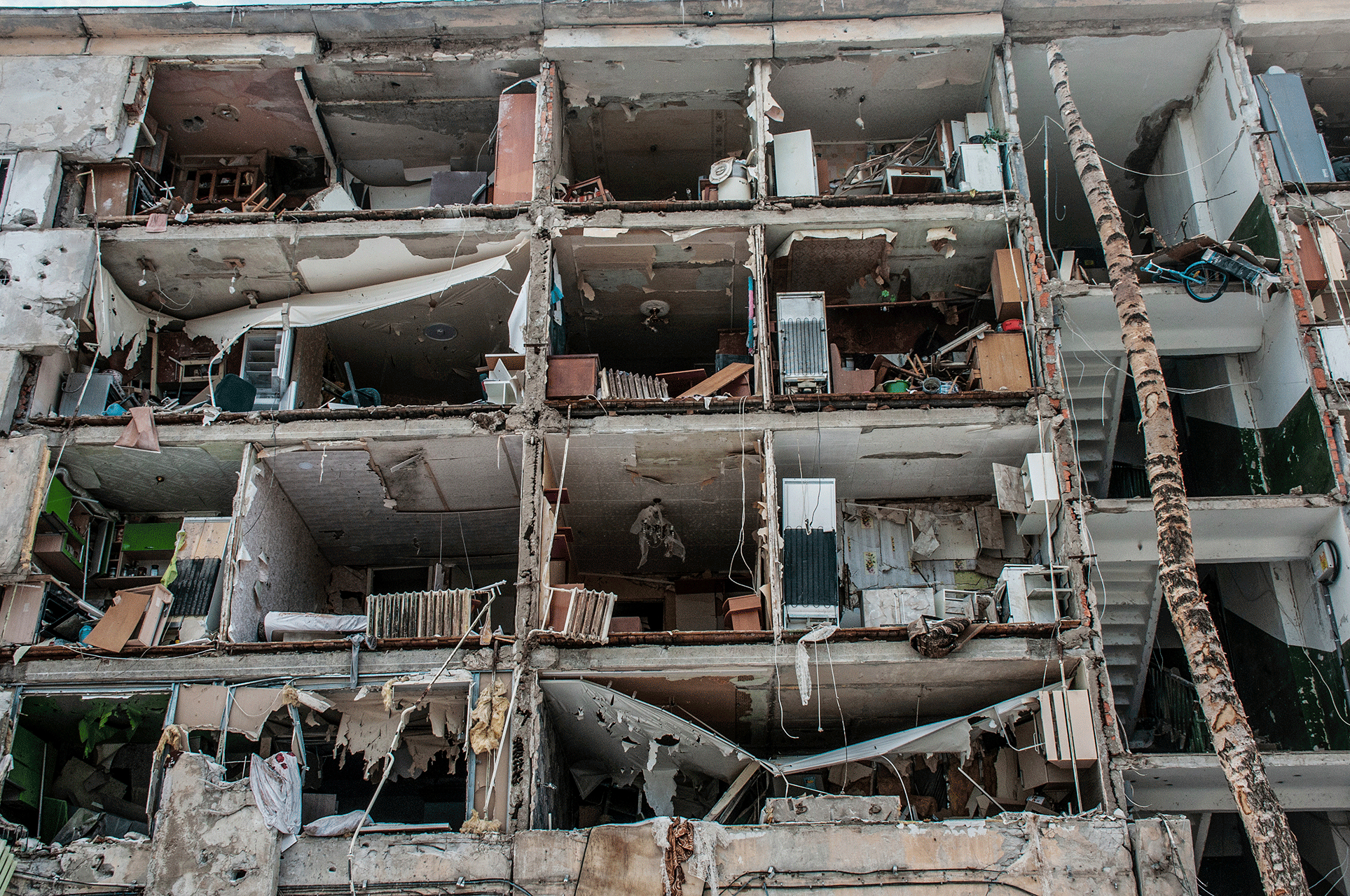 A view of destroyed apartments damaged by shelling in Kharkiv, Ukraine, Sunday, March 13, 2022. 