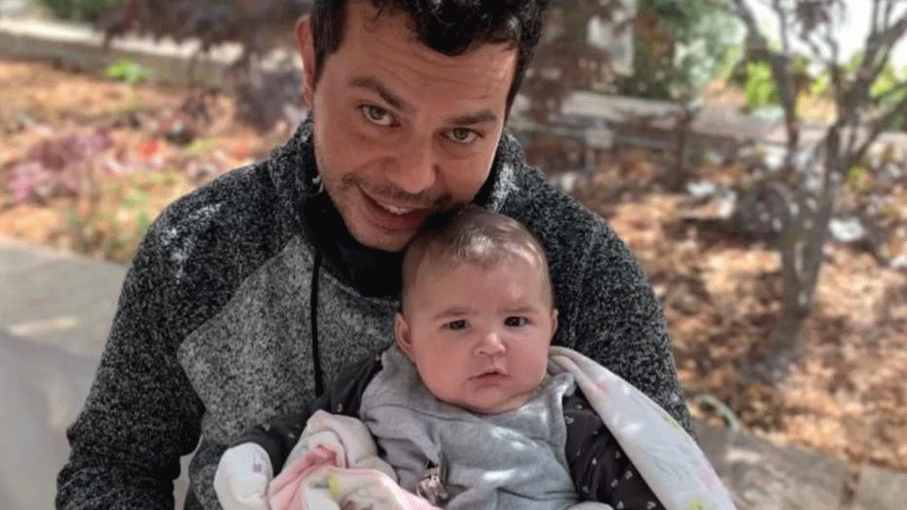 Diego Damis, 41, holds his niece. He was the victim of a fatal stabbing in Kenwood Feb. 25. 