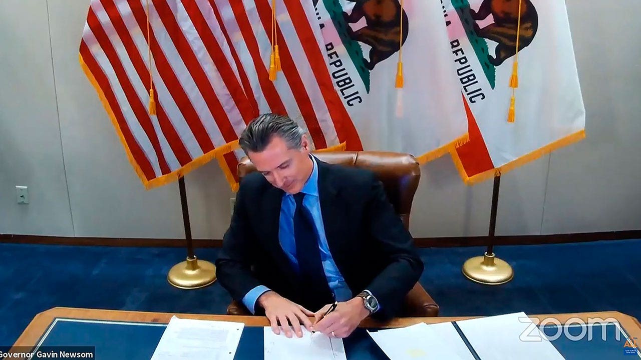 California in crisis, Newsom focused on slavery reparations