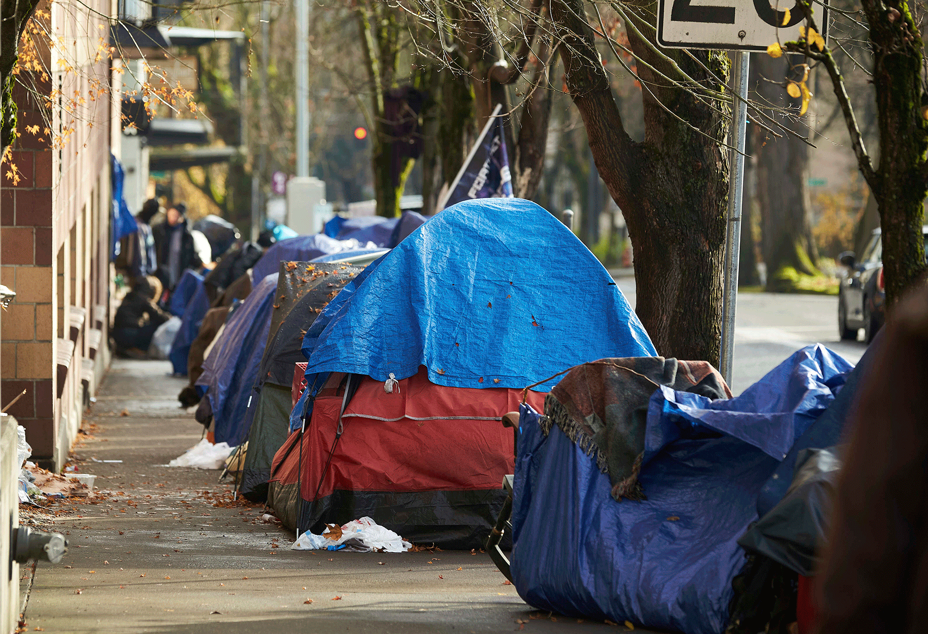 Tents line the sidewalk on SW Clay St. in downtown Portland, Oregon, on Dec. 9, 2020.
