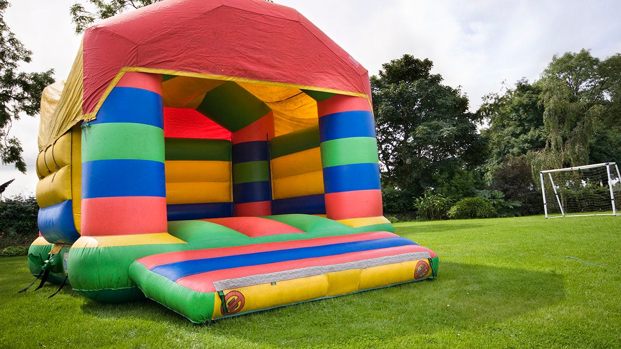 NC mom's terrifying video shows bounce house picked up by wind, nearly smashing into child