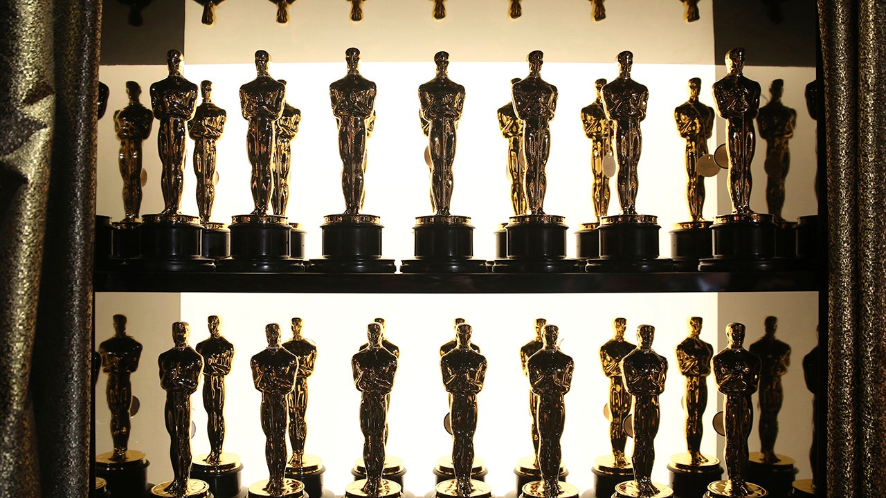 Oscar statuettes appear backstage