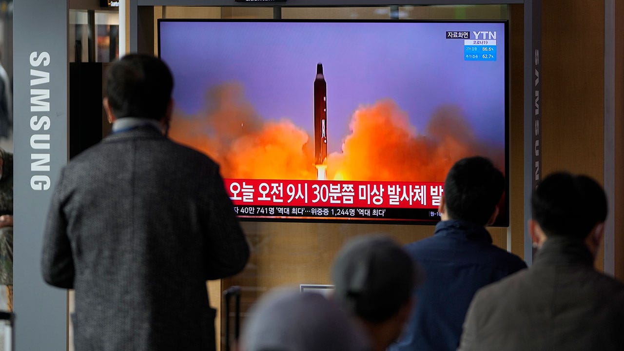 North Korea fires missile over Japan;  splashes into the sea, and residents are warned to seek cover