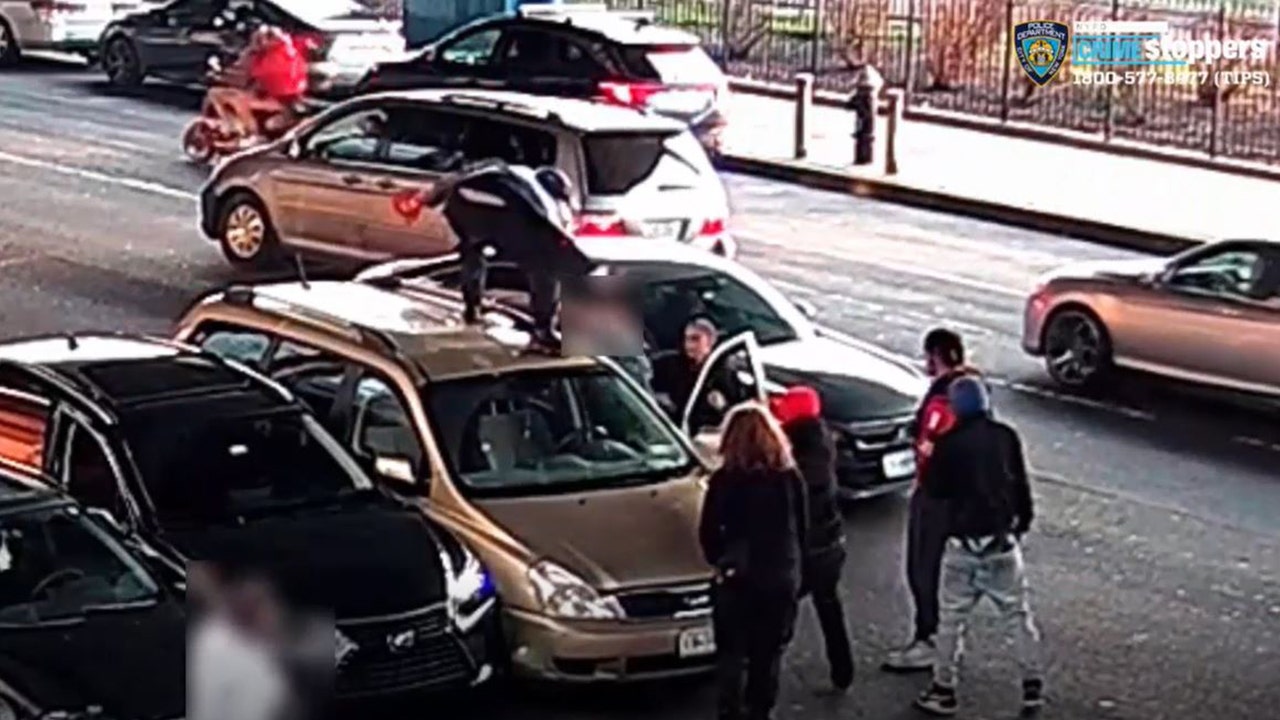 Shocking NYC carjacking caught on video as group pummels driver, stomps on car
