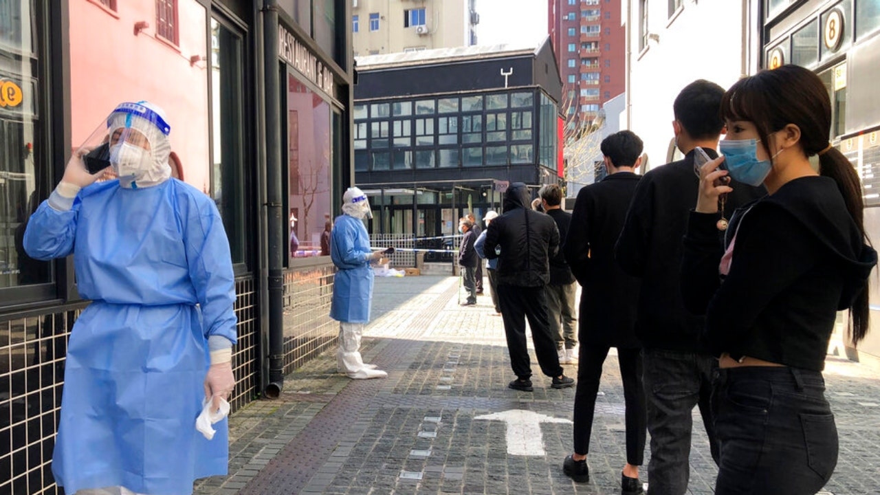 Shanghai allows 4M out of homes as COVID rules ease