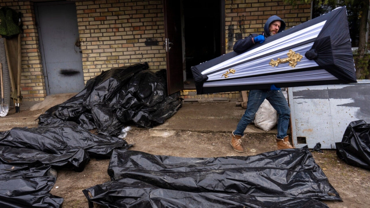 Ukrainians pore over tragic aftermath of Russian invasion