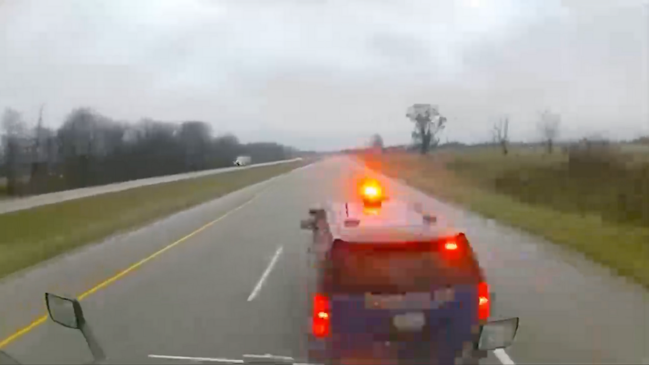 Michigan semi-truck crashes into state trooper, officer left with non-life threatening injuries