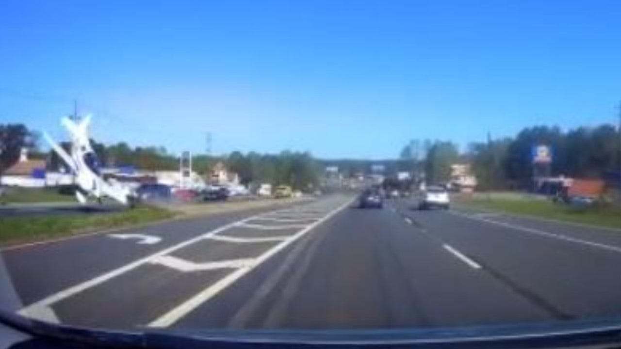 Georgia driver's dashcam captures plane crashing onto busy highway