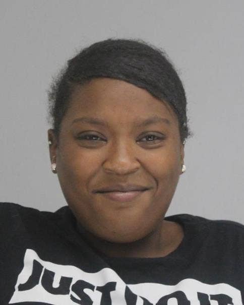 Dallas woman all smiles after being arrested for allegedly leading police on a car chase