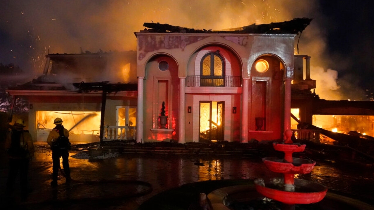 Fire destroys mansions in Southern California, evacuations ordered