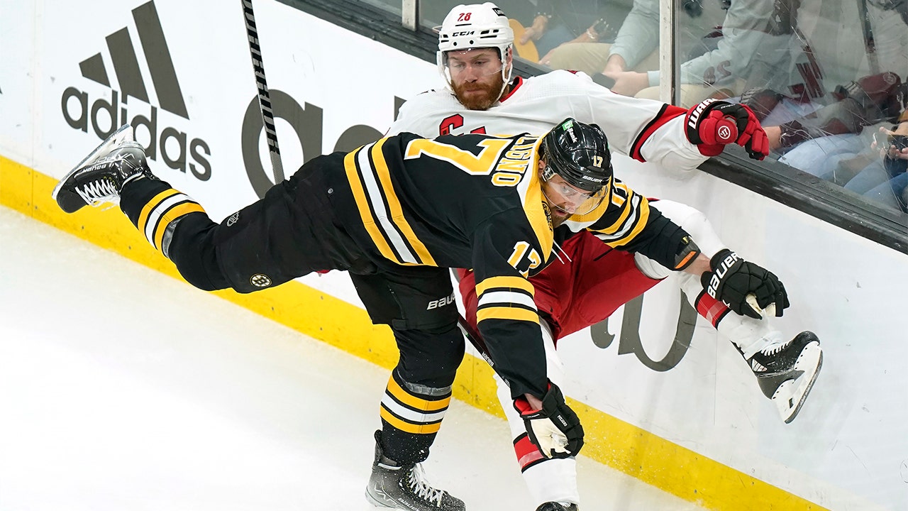 Brad Marchand scores twice, Bruins beat Canes to tie series