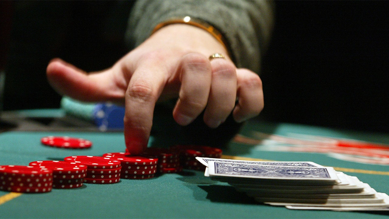 Pro poker player arrested on fraud, money laundering charges in connection to alleged sports betting scheme