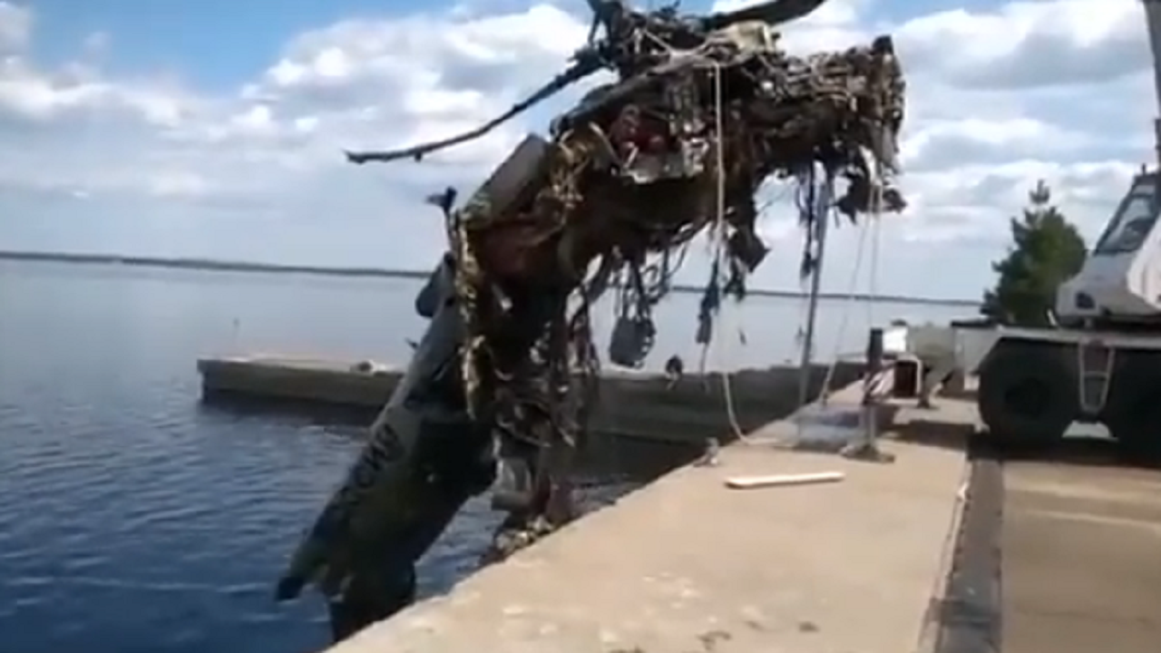 Ukraine posts video of destroyed Russian helicopter being fished out of reservoir