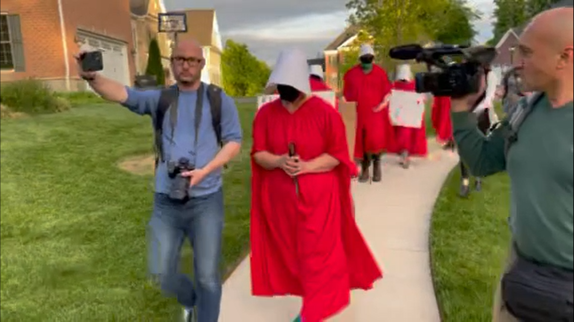 Handmaid-clad protester says Justice Barrett, mom of 5 biological kids, doesn’t know about full-term pregnancy