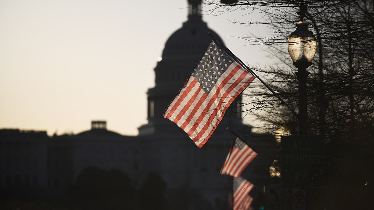 Washington DC Mayor Bowser adds 51st star to American flags displayed on Pennsylvania Ave ahead of Flag Day