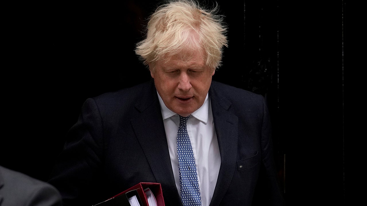 British Prime Minister Boris Johnson leaves 10 Downing Street to attend the weekly Prime Minister's Questions at the Houses of Parliament, in London, Wednesday, May 25, 2022. (AP Photo/Matt Dunham, File)