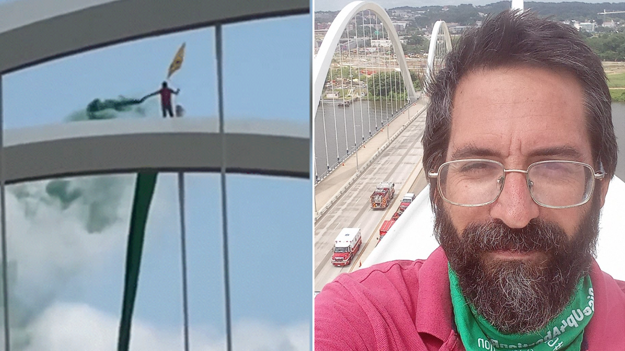 Washington DC bridge shut down after man scales archway to protest Roe