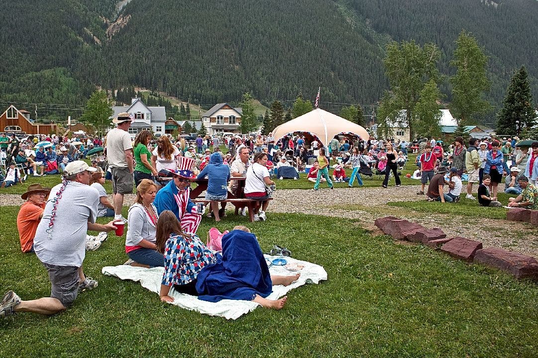 Family gather is open fields for 4th of July