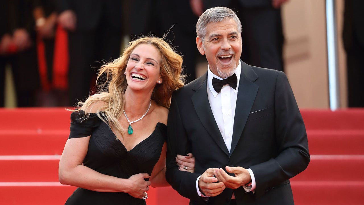 Julia Roberts, Clooney reunite movie trailer for 'Ticket to