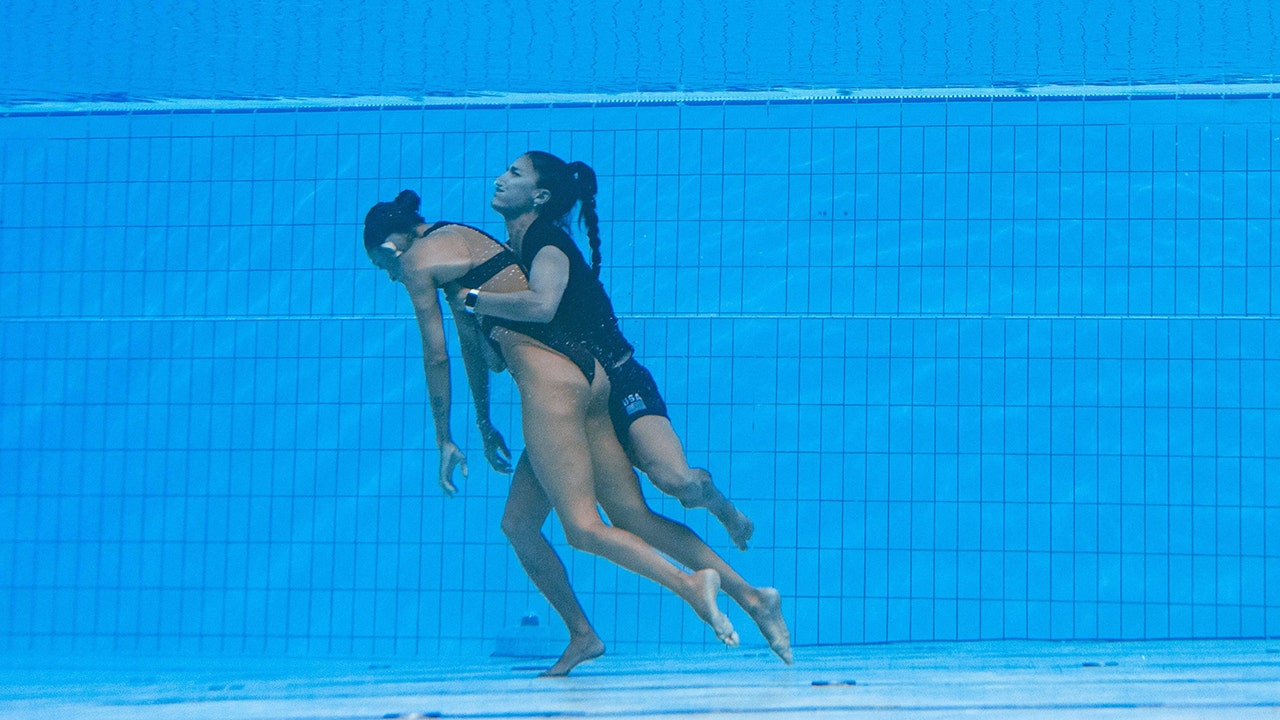 Coach rescues US artistic swimmer after she faints in pool during World Championships