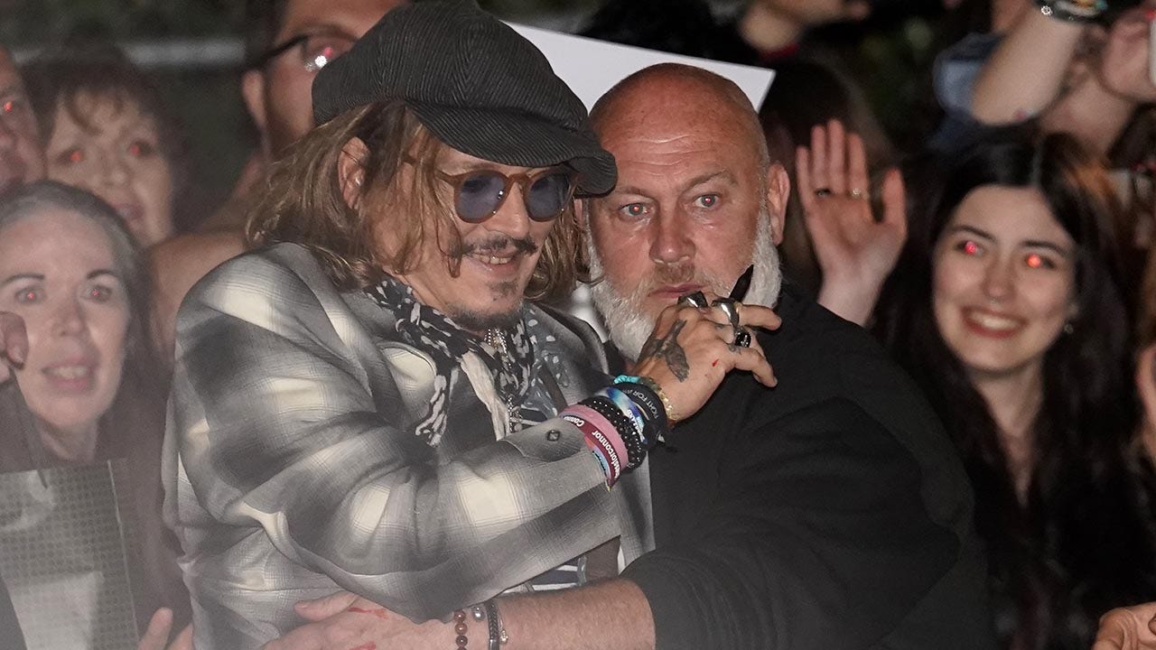 Johnny Depp mobbed by 'Happy Birthday'-singing fans on last night of UK tour with Jeff Beck