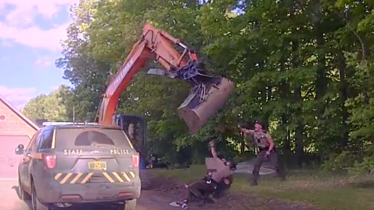 Vermont father accused of swinging excavator at troopers as they arrested his son